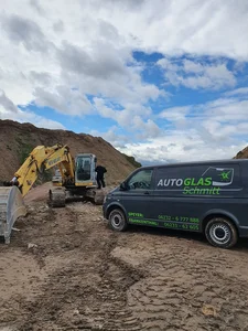 Bagger Scheibentausch auf der Baustelle
